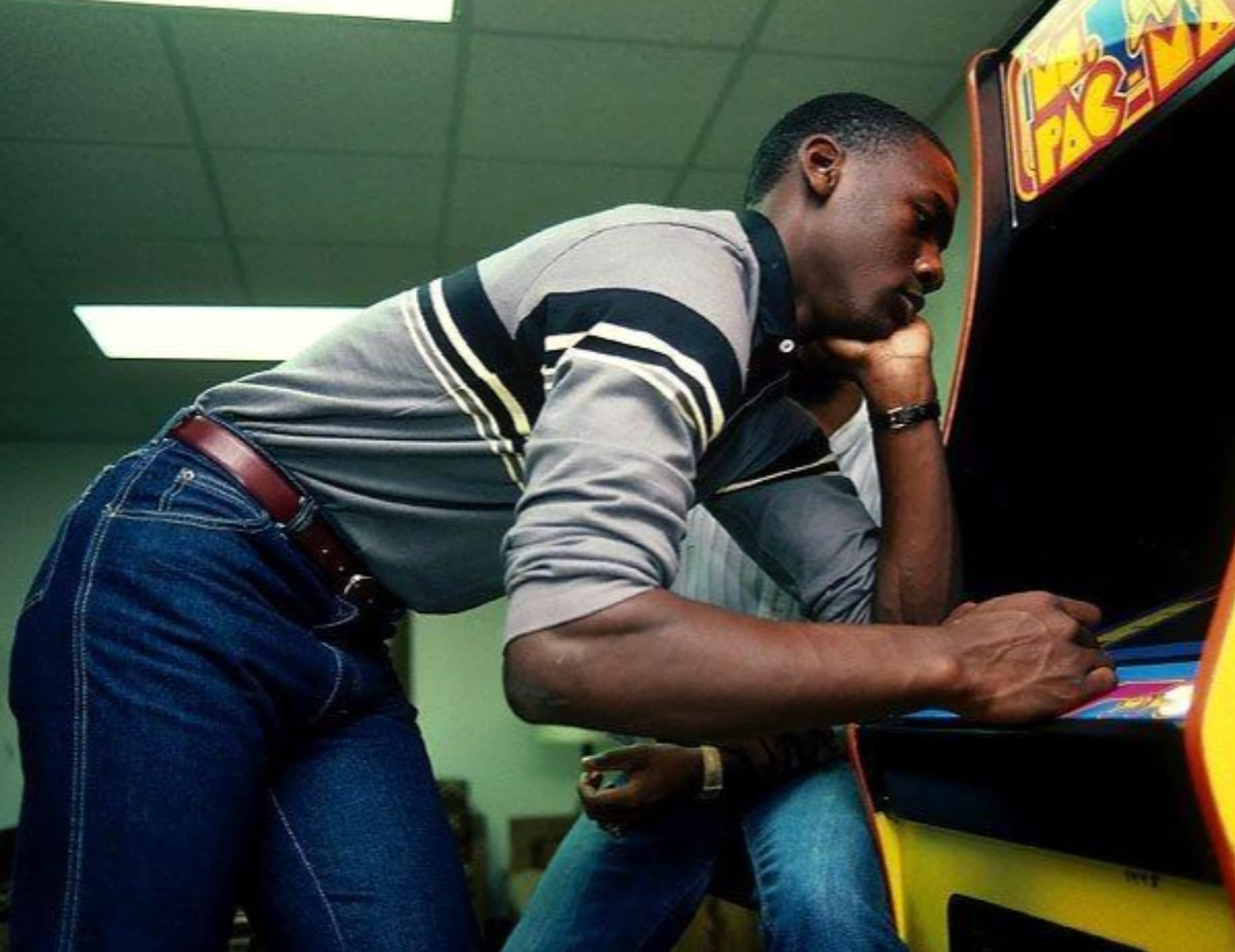 “Michael Jordan playing Pac-Man at UNC in 1983.”